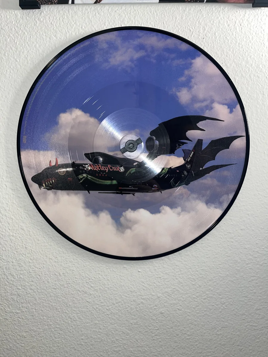 Picture disc displayed on a wall